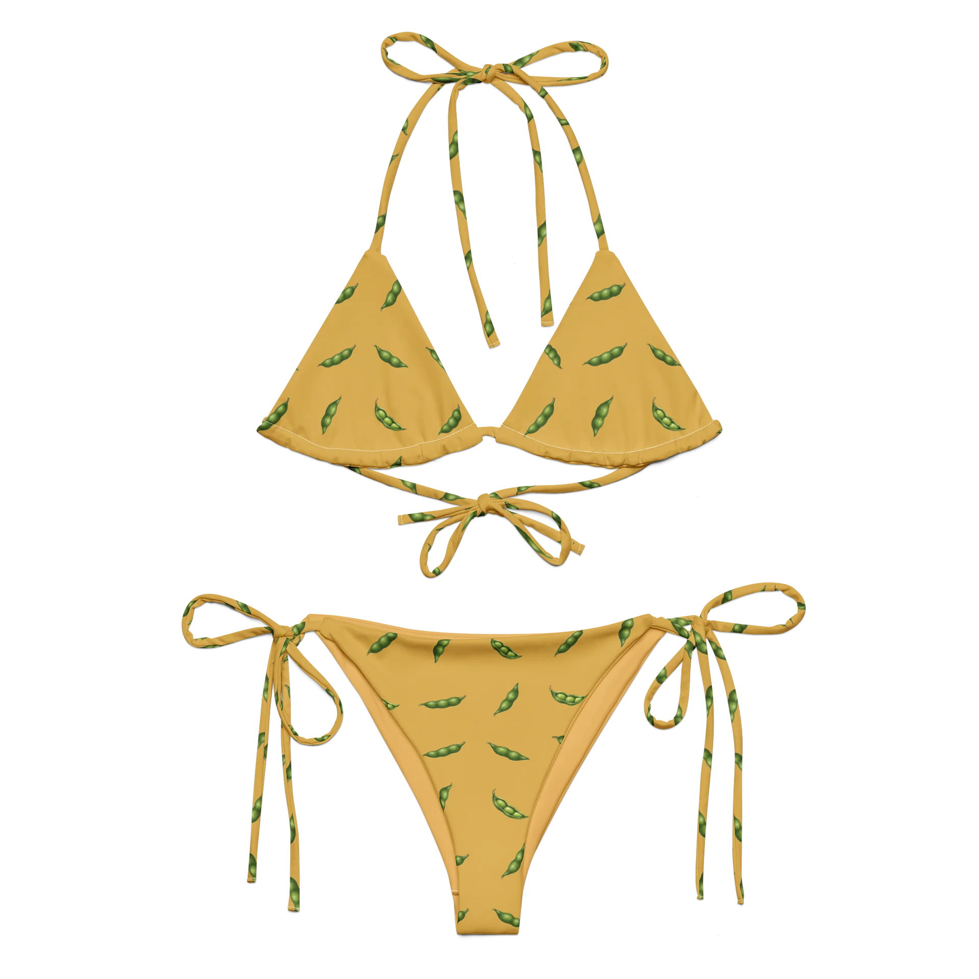 Warm soybean-gold string bikini with fresh green edamame pods, a triangle top and matching tie-side bottoms